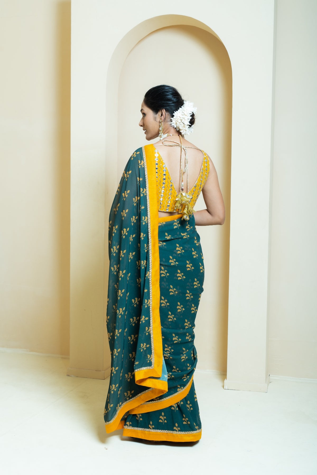 Rich Forest Green and Mustard Motif Georgette Saree