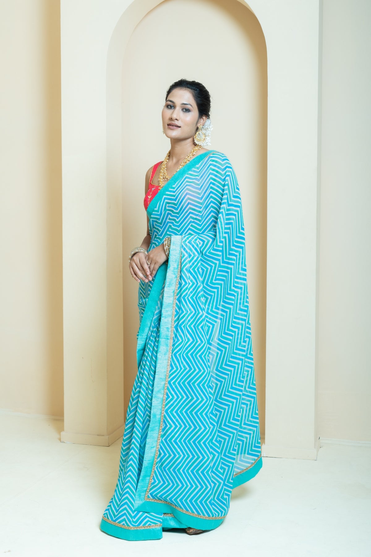 Graceful Aqua and Neon Pink Chevron Print Saree